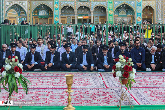 گزارش تصویری تعویض پرچم گنبد حرم حضرت معصومه(س) 